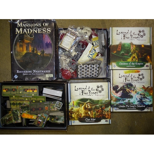 261 - A collection of Fantasy Flight board games, comprising: 'Star Wars Rebellion', (opened, contents int... 