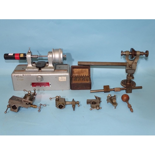 456 - A clockmaker's bench lathe with various accessories including a compound cross slide, together with ... 