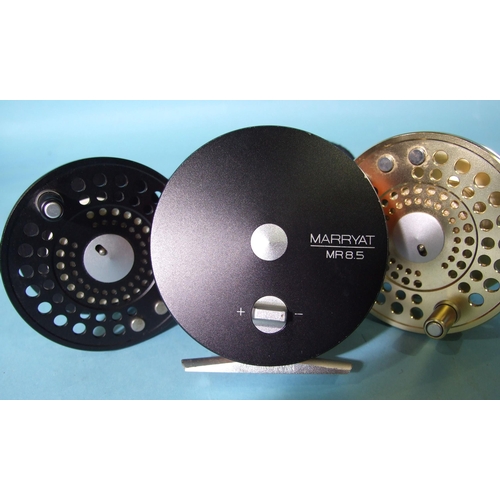 332 - A Marryat MR8.5 fly reel finished black, with two spare spools and pouch.