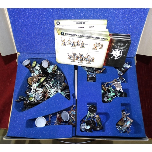 267 - A collection of Games Workshop Warhammer figures and accessories, (a/f), contained in a KR metal-mou... 