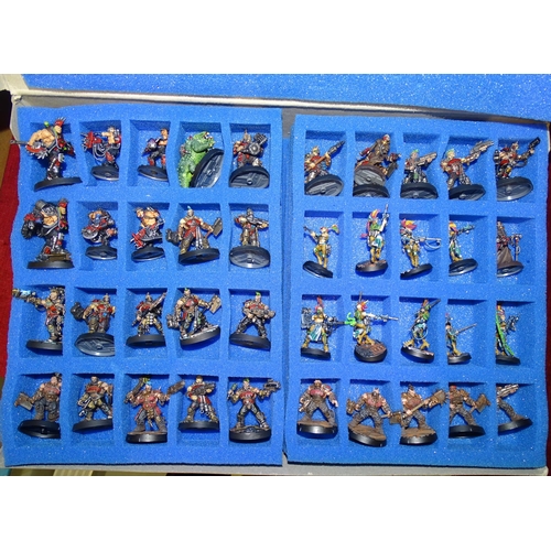 267 - A collection of Games Workshop Warhammer figures and accessories, (a/f), contained in a KR metal-mou... 