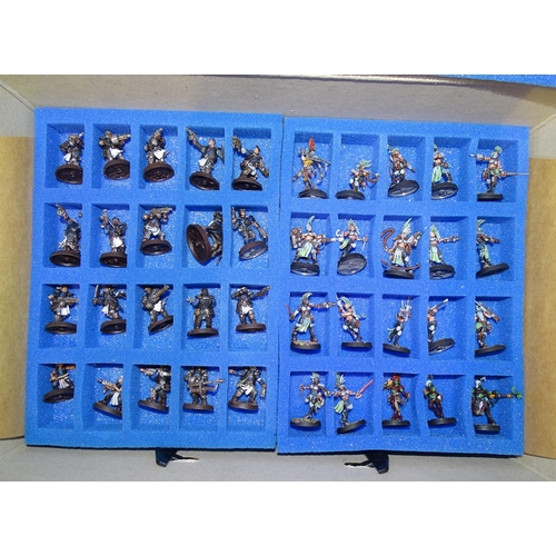 267 - A collection of Games Workshop Warhammer figures and accessories, (a/f), contained in a KR metal-mou... 