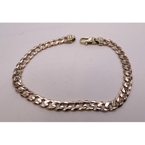 400 - A 9ct gold curb-link bracelet, 20cm long, 10.3g.