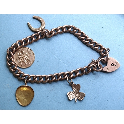 402 - A 9ct rose gold curb-link bracelet with padlock clasp and four charms, (one not marked as 9ct gold),... 