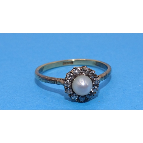 418 - A diamond and pearl cluster ring set eleven old-cut diamonds around a cultured pearl, in 18ct gold m... 