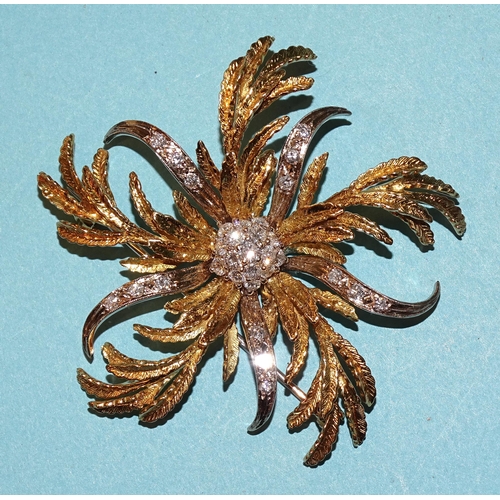 428 - A spectacular yellow and white gold floral brooch of engraved yellow gold and brilliant-cut diamond ... 