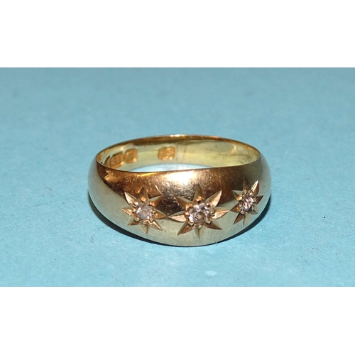 474 - An early-20th century 18ct gold gipsy ring set three brilliant and 8/8-cut diamonds, size K½, 4.4g.... 