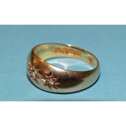 474 - An early-20th century 18ct gold gipsy ring set three brilliant and 8/8-cut diamonds, size K½, 4.4g.... 