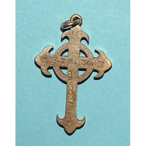 489 - An 18ct gold cross pendant with scroll engraving, 35 x 25mm, 5.9g.