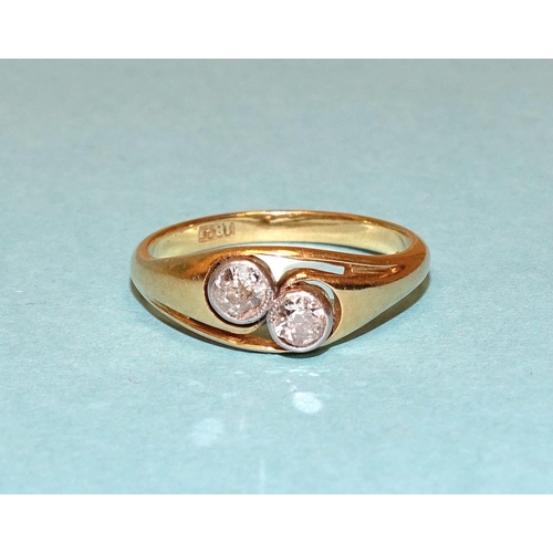 547 - An 18ct gold crossover ring set two old brilliant-cut diamonds, size M, 3g.