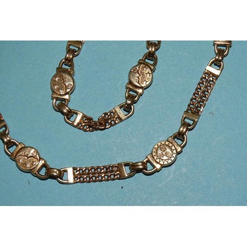 577 - A 9ct gold necklace of small circular plaques, sun on one side, moon and stars on the other, joined ... 