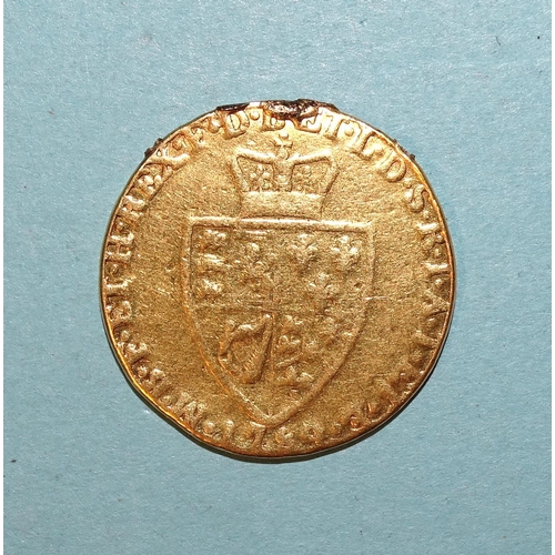 609 - A George III 1789 spade guinea with solder to rim, (very worn), 8.1g.