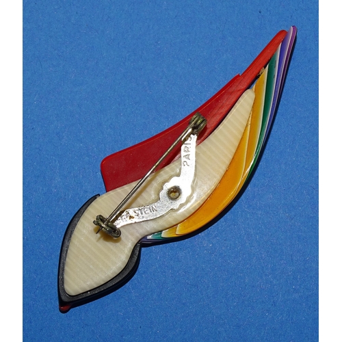 649 - Léa Stein, Paris, a sailboat brooch pin c1970’s with rainbow-coloured sails and black, red and cream... 