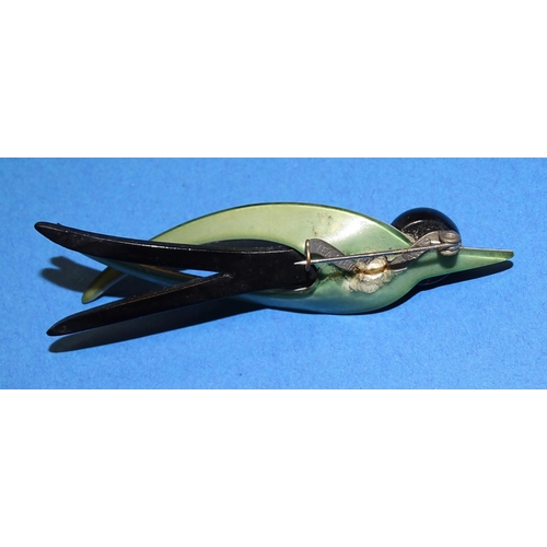 653 - Léa Stein, Paris, a swallow brooch pin c1970’s with black body, dark blue head and green glitter win... 