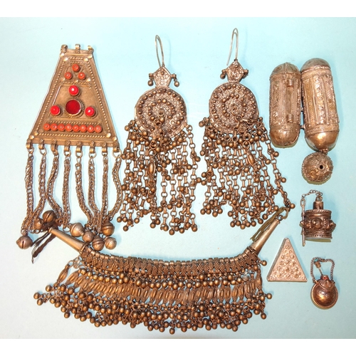 671 - An Omani white metal necklace and earrings, a Turkoman pendant and other white metal items.... 