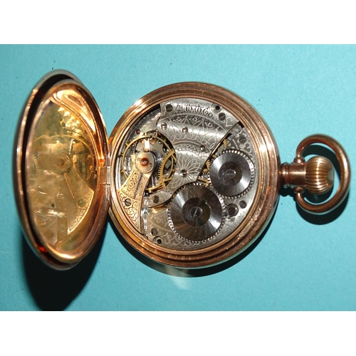 680 - Waltham, a gold-plated hunter-cased keyless pocket watch, with white enamel dial, Roman numerals and... 