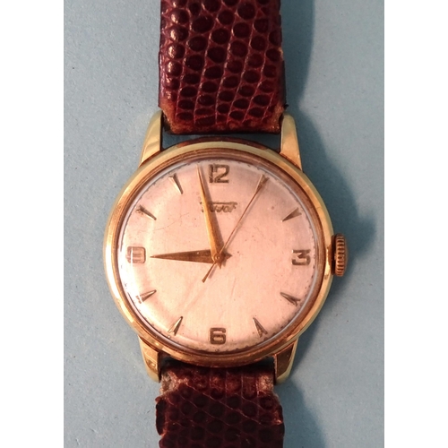 694 - A gentleman's 14ct gold-cased Tissot wristwatch, the silvered dial with applied Arabic and dart nume... 