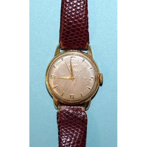 694 - A gentleman's 14ct gold-cased Tissot wristwatch, the silvered dial with applied Arabic and dart nume... 