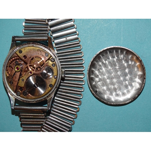 704 - Omega, a gentleman's steel-cased wristwatch, the 32mm silvered dial, (discoloured), with Arabic and ... 