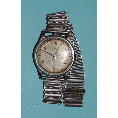 704 - Omega, a gentleman's steel-cased wristwatch, the 32mm silvered dial, (discoloured), with Arabic and ... 