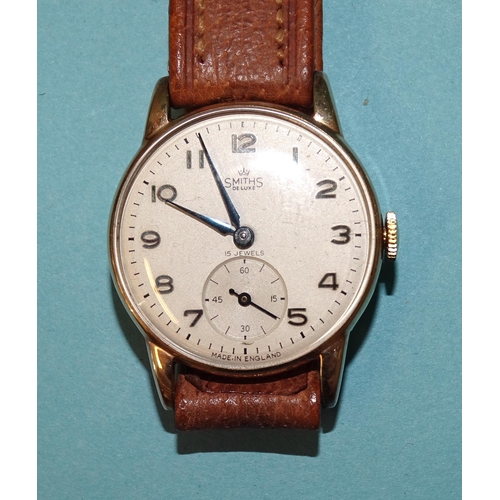 712 - A gentleman's Smiths 9ct gold wristwatch, 1958, the silvered dial with Arabic numerals and seconds s... 