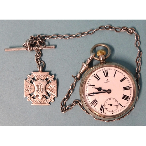 714 - Omega, a steel-cased open face keyless pocket watch, the white enamel dial with Roman numerals and s... 