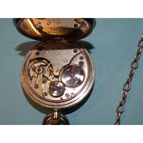 714 - Omega, a steel-cased open face keyless pocket watch, the white enamel dial with Roman numerals and s... 