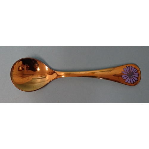 748 - A silver gilt 1980 spoon with enamel flower, maker's mark RA AB, Georg Jensen, ___5.39oz.... 