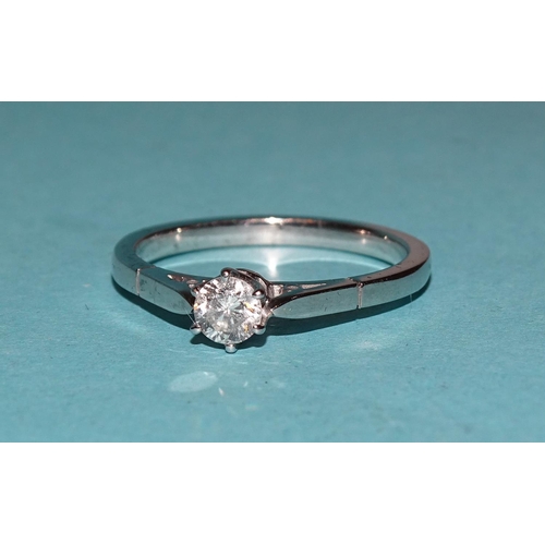 558 - A solitaire diamond ring claw-set a brilliant-cut diamond of approximately 0.4cts, in unmarked white... 