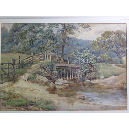 136 - Charles James Adams (1859-1931) COUNTRY STREAM AND FOOTBRIDGE Signed watercolour, 25.5 x 37cm.... 