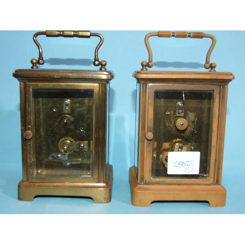 196 - A French brass carriage clock, the dial with Arabic numerals within four glass panels, 14cm high ove... 