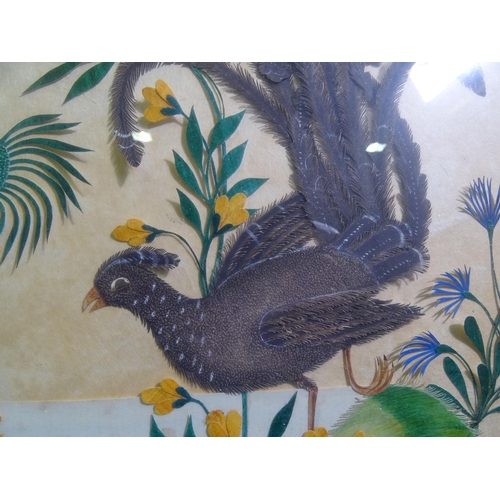 226 - An unusual cut-paper and embossed découpage picture of two exotic birds amongst flowers, foliage and... 