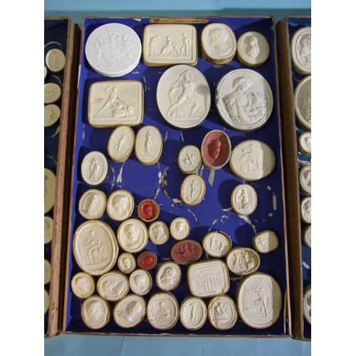 247 - A collection of approximately 165 mainly numbered plaster intaglios in three trays marked Museo, Tom... 