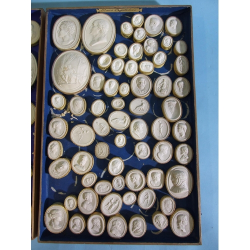 247 - A collection of approximately 165 mainly numbered plaster intaglios in three trays marked Museo, Tom... 