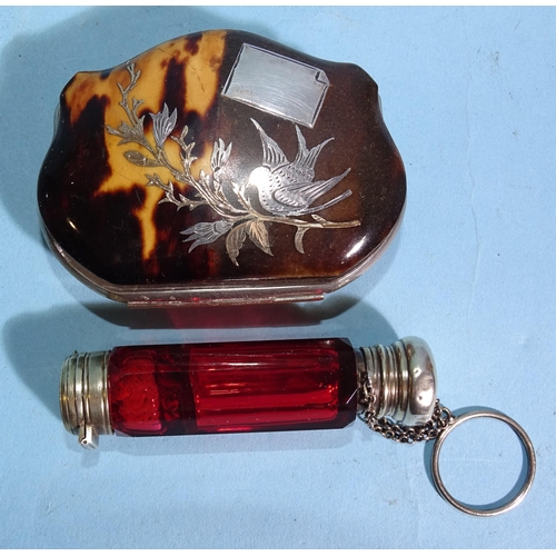 256 - A double-ended cranberry glass scent bottle with gilt metal mounts, 7cm long and a tortoiseshell pur... 