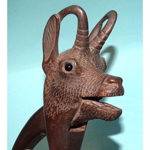 269 - A Black Forest carved wood pair of nutcrackers in the form of a chamois, with glass eyes, 19cm.... 