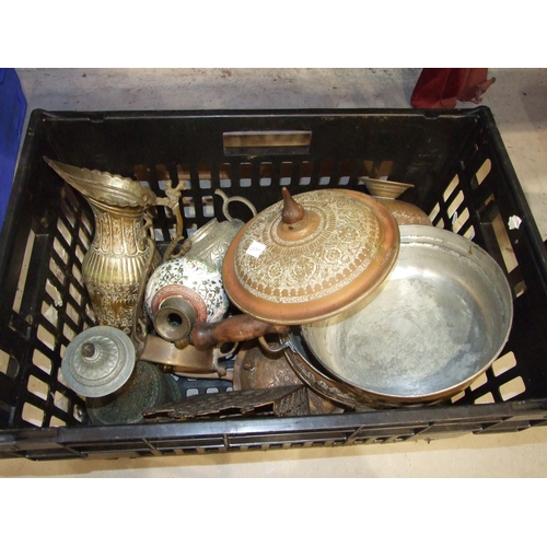 274 - A collection of Middle Eastern embossed trays, cooking wares and other vessels.