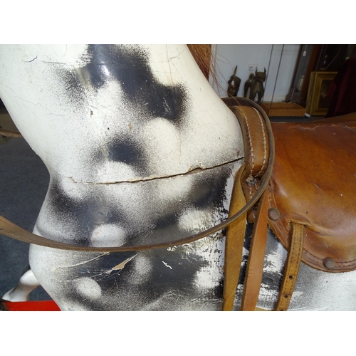 30 - An Edwardian painted dapple grey rocking horse with horsehair tail and mane, leather reins and saddl... 