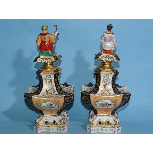 304 - A pair of Paris porcelain large perfume bottles and stoppers decorated with panels of birds and flow... 