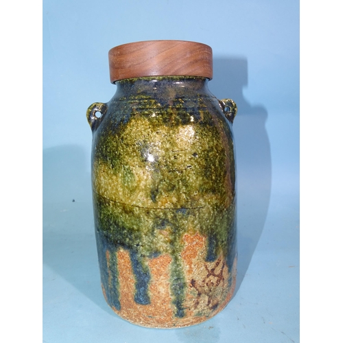 330 - A studio pottery cylindrical vase with incised decoration of two figures, impressed 'Junko, Richmond... 