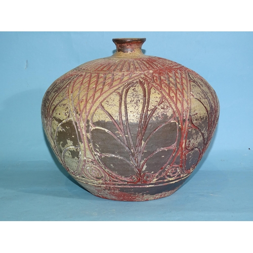 332 - An antique Asian (Cambodian?) pottery compressed shaped jar with incised lattice and leaf decoration... 