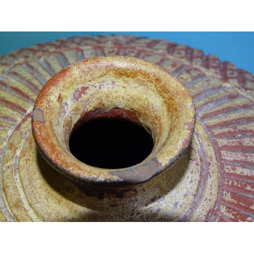 332 - An antique Asian (Cambodian?) pottery compressed shaped jar with incised lattice and leaf decoration... 