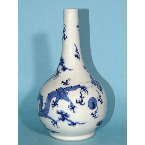 346 - A small blue and white bottle-shaped 'dragon' vase, (chipped), 15cm high.