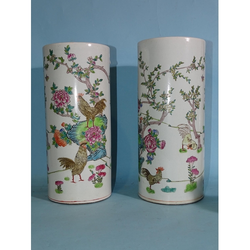 353 - A pair of Chinese famille rose cylindrical vases, a large Imari charger, a small pair of Imari vases... 