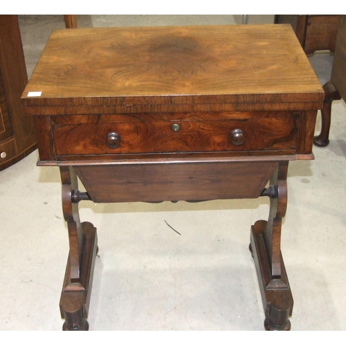 4 - An early-19th century rosewood games and worktable, the rectangular fold-over top with inlaid games ... 