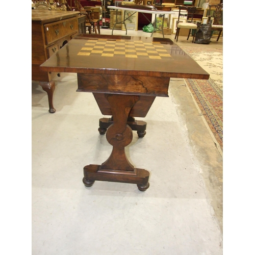 4 - An early-19th century rosewood games and worktable, the rectangular fold-over top with inlaid games ... 