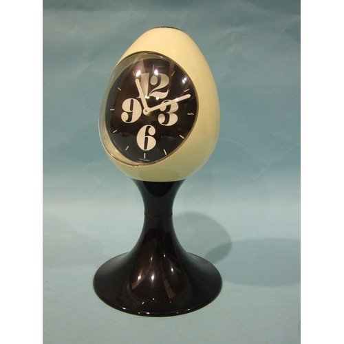 191 - A late-60's/early-70's retro Estyma black and white plastic tulip-style alarm clock, 22.5cm high.... 