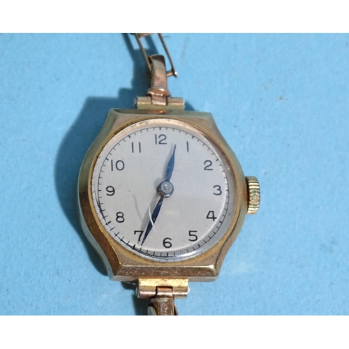 718 - A lady's 9ct-gold-cased manual wrist watch, on 9ct gold sprung bracelet, (no clasp), 12.7g.... 