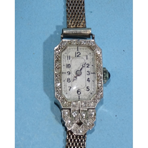 720 - A lady's Art Deco diamond-set manual wrist watch, the platinum octagonal case set twenty-five 8/8-cu... 