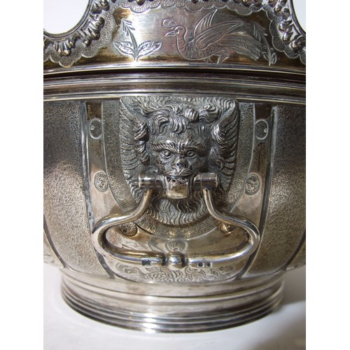 782 - A large silver two-handled punch bowl of circular form  with removeable Monteith collar, on ribbed f... 